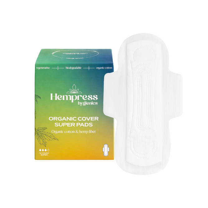 A box of Hempress Hygienics Hemp Super Pad with one pad beside it. The green and yellow box highlights its super absorption, organic cotton, and hemp fiber for a hypoallergenic experience in white text.