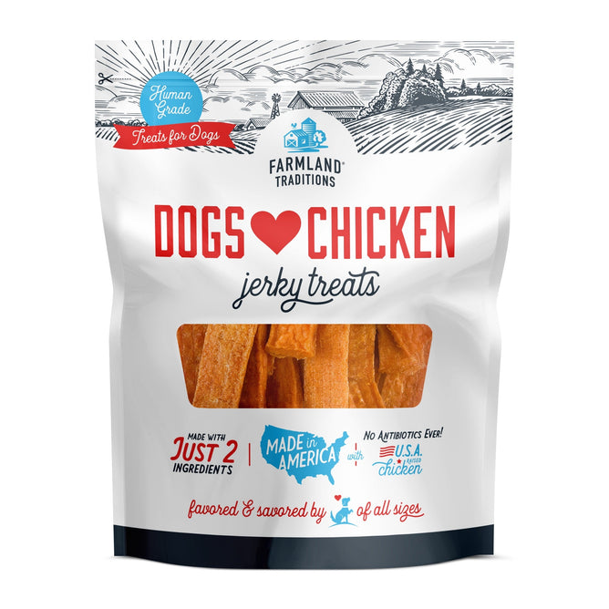 A white and blue Farmland Traditions package of Dogs Love Chicken Jerky Treats boasts human-grade chicken breast, labeled Made with Just 2 Ingredients and Made in America. It features a red heart for Dogs Love Chicken, plus farm and USA map illustrations.