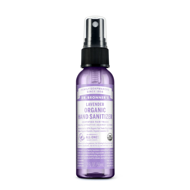 A 2 fl oz bottle of Dr. Bronner’s Organic Hand Sanitizer Spray features a black spray cap and purple label with product details and branding on the front.
