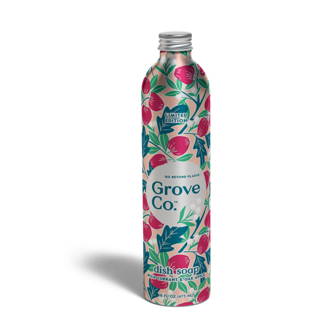 A limited edition Grove Co. Dish Soap Refill - Fall Collection in recyclable aluminum features pink and green floral and fruit designs, a silver cap, and Red Currant & Goji Berry scent—perfect for fall.