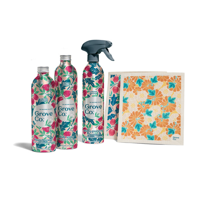 The Grove Co. Cleaning Essentials Set - Fall Collection includes two hand soap bottles, a multi-purpose cleaner spray, and patterned cloths, all with matching floral packaging and limited edition fall scents.