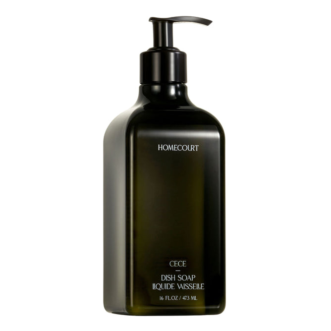 A black pump bottle labeled Homecourt contains Dish Soap, 16 fl oz (473 mL), with plant-derived surfactants. LIQUIDE VAISSELLE appears beneath the product name on the label.