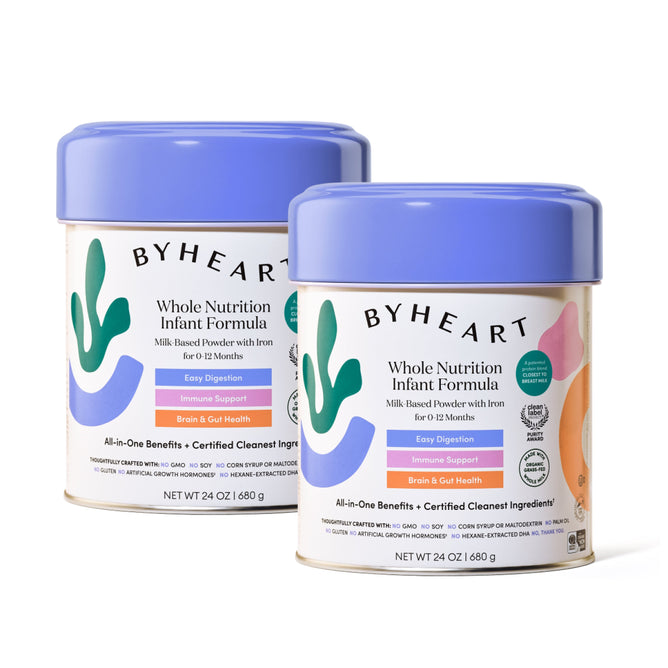 Two cans of ByHeart Whole Nutrition Infant Powder Formula, made with organic, grass-fed whole milk. Each 24 oz (680 g) can features a pastel purple lid, colorful design, and highlights benefits like easy digestion, immune support, and brain & gut health.