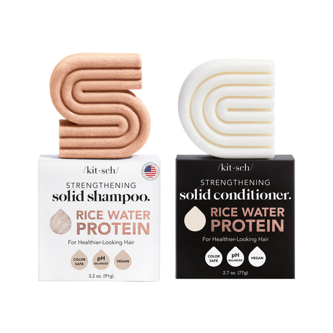 Kitsch Rice Water Protein Haircare Set: vegan boxed shampoo bar (peach, S-shaped, white box) and conditioner bar (white, black box).