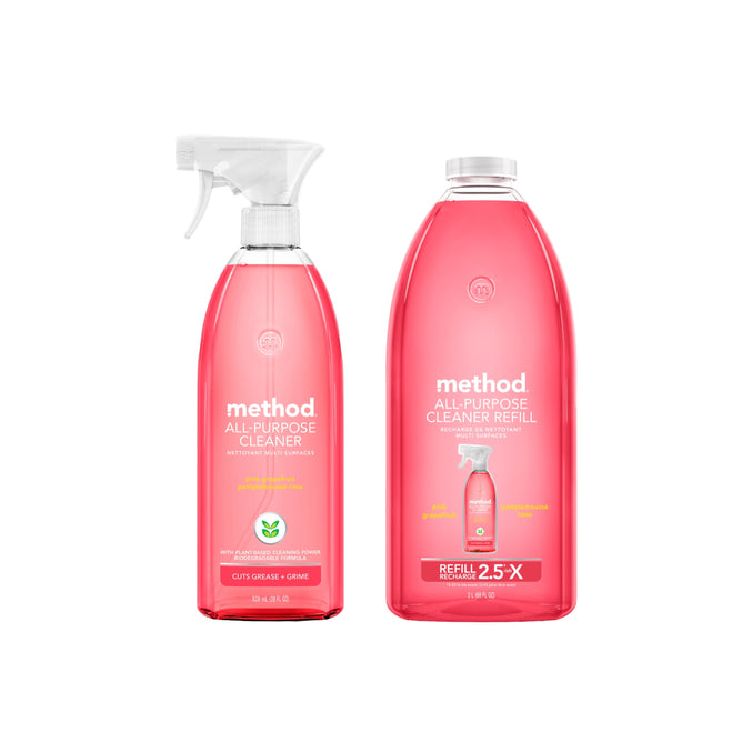 The method All Purpose Cleaner Starter Set in Pink Grapefruit includes a spray bottle and a larger refill, both with white labels, highlighting plant-based ingredients and effective grease-cutting power.