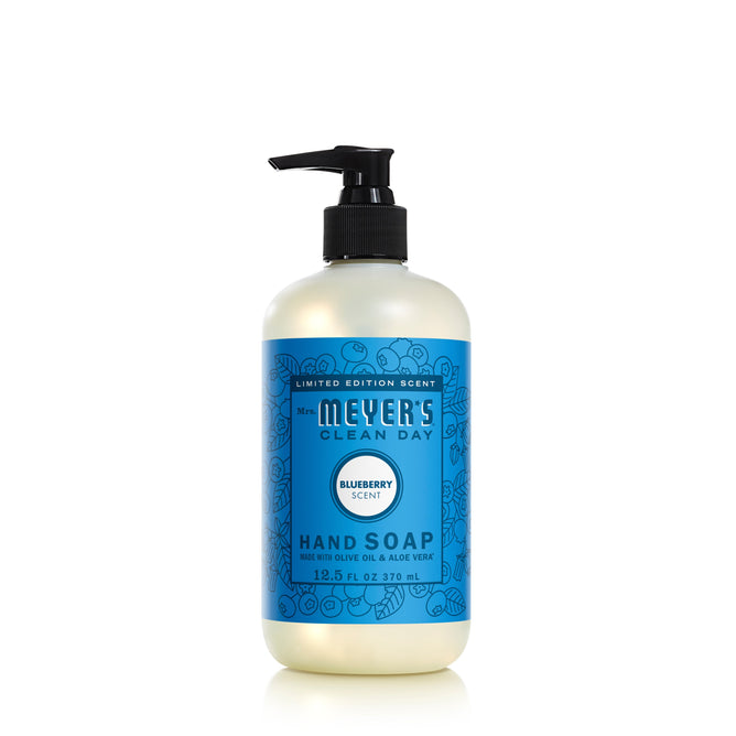 Mrs. Meyers Clean Day Hand Soap features a 12.5 fl oz pump bottle with a blue label and decorative patterns, offering a cruelty-free blueberry scent enriched with olive oil, aloe vera, and essential oils.