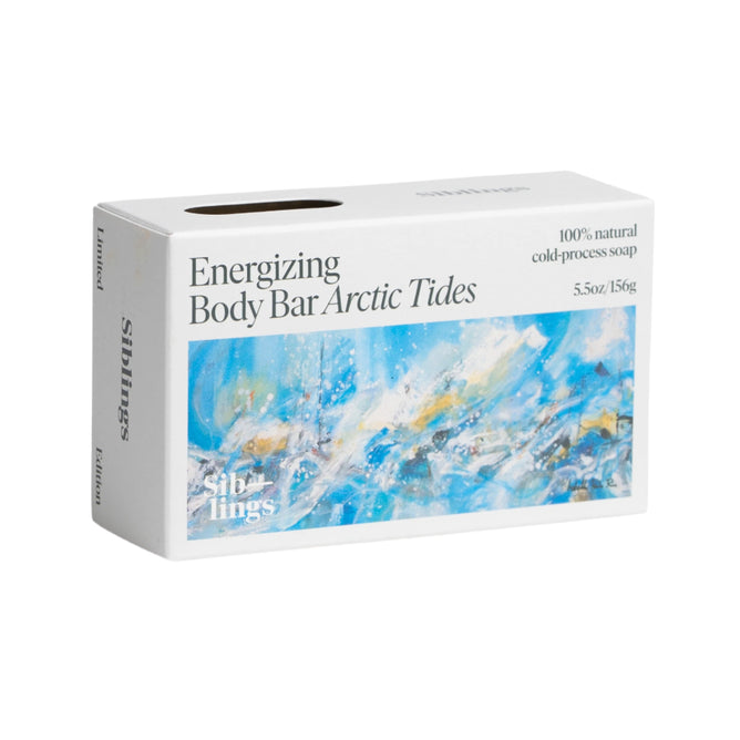 Siblings Energizing Body Bar in Arctic Tides scent features an abstract design in blue, white, and gold. This 5.5 oz/156 g cold-processed soap is 100% natural and infused with olive oil and sea kelp.