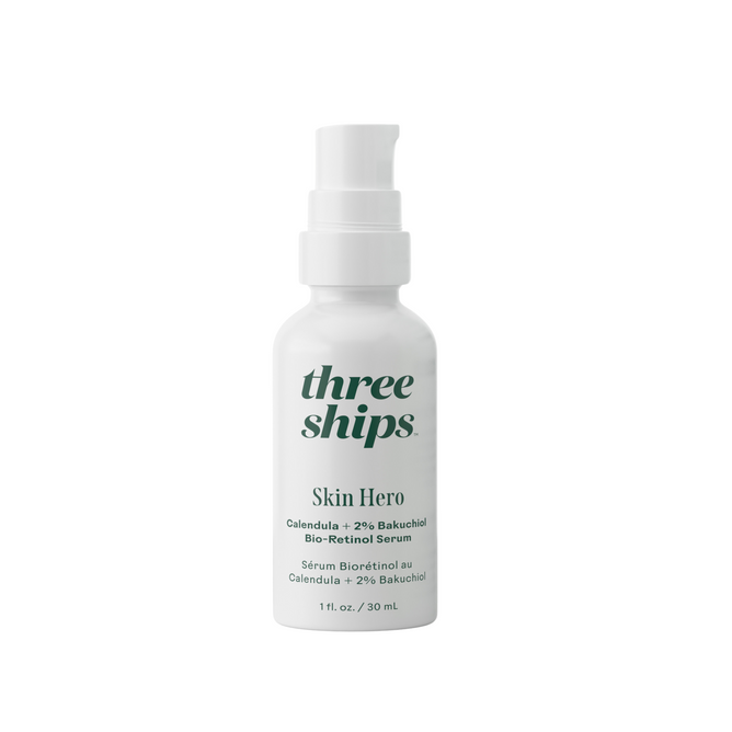 A 30 ml (1 fl. oz.) white bottle of Three Ships Skin Hero Calendula + 2% Bakuchiol Bio-Retinol Serum, with a pump dispenser and green text highlighting its gentle retinol alternative formula.