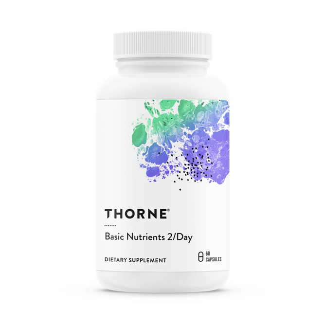 A white bottle labeled Thorne Basic Nutrients 2/Day displays a colorful abstract design at the top and contains 60 capsules of absorbable vitamins for essential foundational support, marketed as a dietary supplement.