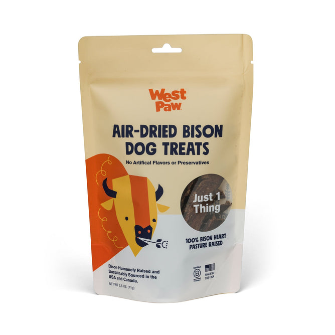 A beige and orange package of West Paw Dog Treats—Air-Dried Bison Heart—features a cartoon bison, product details, and text highlighting 100% sustainably sourced bison heart, omega-3 fatty acids, and no artificial flavors or preservatives.
