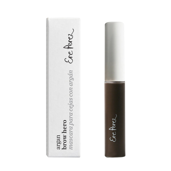A brown eyebrow mascara bottle with a white cap sits next to its matching box labeled Ere Perez Argan Brow Hero. This tinted gel, infused with vegan fibers, offers a sleek design perfect for effortlessly enhancing brows.
