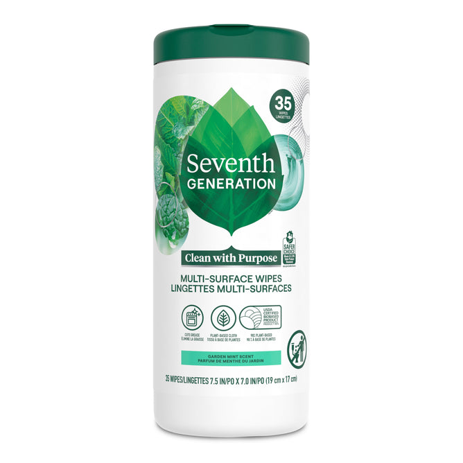 A Seventh Generation cylindrical container of Multi-Surface Wipes features a leaf-adorned label and garden mint scent with eucalyptus essential oils. Contains 35 refreshing wipes for all surfaces.