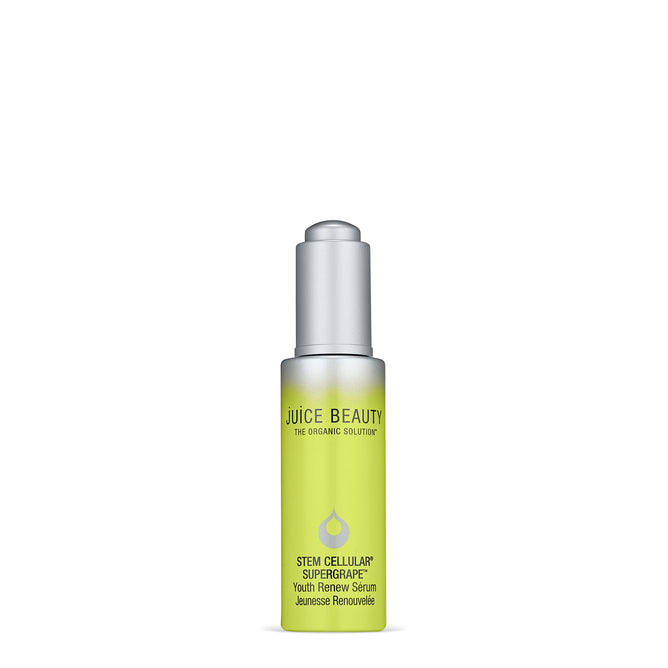 A bright green bottle of Juice Beautys Stem Cellular SuperGrape Youth Renew Serum with Hyaluronic Acid for anti-wrinkle benefits features a silver pump top and the brand logo and product name on a pristine white background.