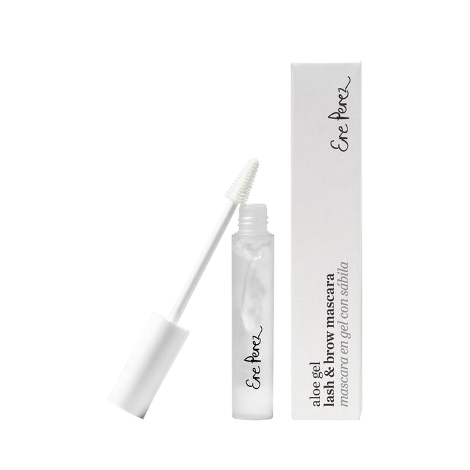 The clear mascara tube and wand are shown with its matching box, featuring elegant cursive text. Both items are white with black lettering, highlighting the Aloe Gel Lash & Brow Mascara by Ere Perez, crafted from natural ingredients for a gentle application.