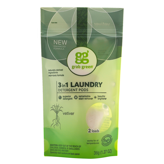A package of grab greens 3 in 1 Laundry Detergent Pods - Sample, featuring a non-toxic green and yellow design. Includes 2 vetiver-scented pods weighing 36g (1.27 oz) with a new enhanced formula, acting as detergent, stain remover, and brightener.