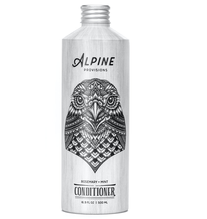 Alpine Provisions silver 16.9 fl oz (500 ml) conditioner bottle, featuring an intricate owl design, offers a refreshing rosemary and mint scent for natural hair care nourishment.