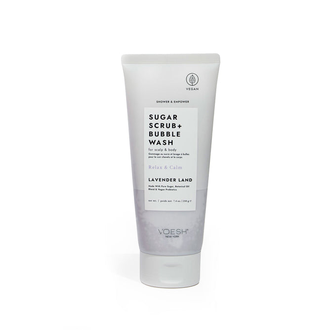 A white tube of VOESH New Yorks Sugar Scrub + Bubble Wash - For Scalp and Body in Lavender Land features lavender and eucalyptus scents, emphasizing Relax & Calm and Vegan on the label, with minimalist packaging.