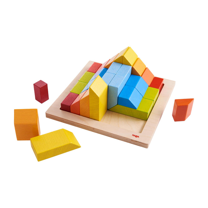 The HABA Creative Stones - 3D Wooden Arranging Blocks feature multicolored geometric pieces on a square base, forming a vibrant pyramid. With shades of yellow, orange, red, blue, and green, the blocks allow for endless creative arrangements.