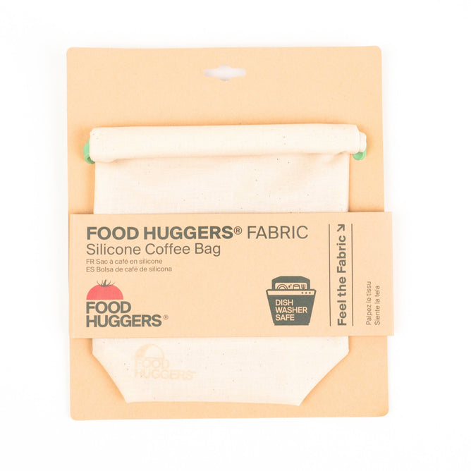 The packaging of Food Huggers Fabric & Silicone Coffee Bag in beige highlights Silicone Coffee Bag and Dishwasher Safe, features airtight seal technology, and comes in a minimalist cardboard design.