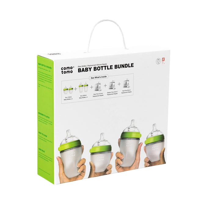 The Baby Bottle Gift Set by Comotomo features bottles resembling breastfeeding to minimize colic risk. The white packaging with green accents displays four bottles with green tops and handy handles.
