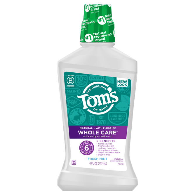 Toms of Maine Whole Care Anticavity Mouthwash offers 16 fl oz (473 mL) of alcohol-free freshness, featuring six benefits, fresh mint, and natural ingredients, as highlighted on its purple and white label.