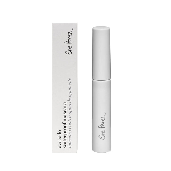 The white mascara tube and box feature the Ere Perez branding, with the product name Avocado Waterproof Mascara in English and Spanish. This vegan mascara is nourishing and showcases a minimalist design.