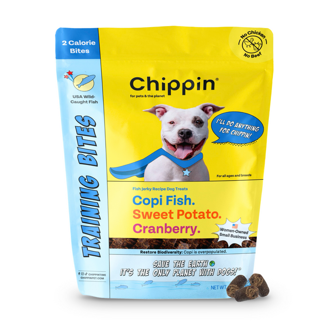 A bag of Chippin Wild-Caught Fish Training Bites, made with USA wild-caught Silver carp, sweet potato, and cranberry. The packaging shows a cartoon dog in a blue superhero cape saying, I’ll do anything for Chippin! Enjoy treats that help restore biodiversity.