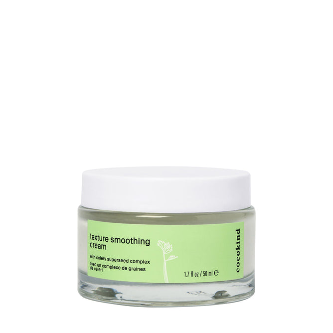 A 1.7 fl oz (50 ml) jar of Cocokind Texture Smoothing Cream enriched with Tsubaki seed oil, featuring a green label and white lid adorned with text and a plant stem illustration, perfect for daily moisturizing.