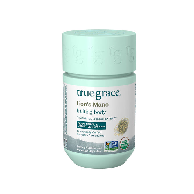 The True Grace Lions Mane light green bottle contains 60 vegan capsules with full-spectrum mushroom extracts, featuring beta-glucans for brain and cognitive support. The product is labeled organic, non-GMO, and USDA organic certified.