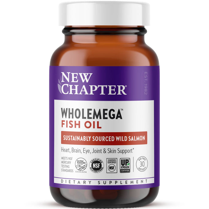 A brown Wholemega™ Fish Oil bottle by New Chapter showcases a purple and white label, highlighting its Sustained Source from Wild Alaskan Salmon. It supports heart, brain, eye, joint, and skin health with Omega-3s DHA & EPA. The supplement includes 30 counts and certification logos.