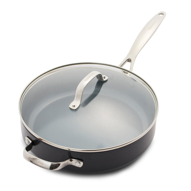 The GreenPan Valencia Pro 4.5 Qt Ceramic Sauté Pan combines style and safety with its sleek black hard anodized aluminum body and non-stick surface. It features a glass lid with a metal handle, dual convenience handles, and is PFAS-free for excellent cooking results in your kitchen.