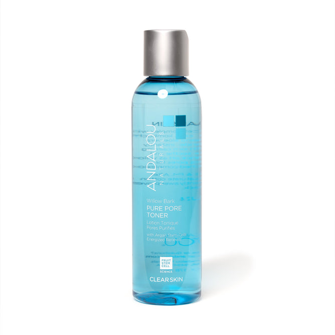 A blue bottle of Andalou Naturals Clear Skin Willow Bark Pure Pore Toner with a silver cap, featuring ingredients like argan stem cells and willow bark, plus probiotic kombucha for radiant skin.