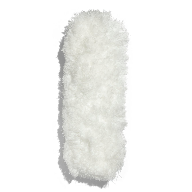 The Grove Co. Duster Attachment Refill is a fluffy, white microfiber attachment with a fuzzy texture against a plain white background. It is reusable and machine washable for easy maintenance.