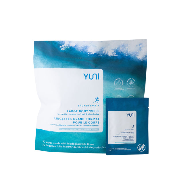 YUNI Shower Sheets come in a large teal and white pouch with a smaller matching packet. These refreshing wipes are infused with biodegradable fibers and peppermint essential oil for a revitalizing experience.