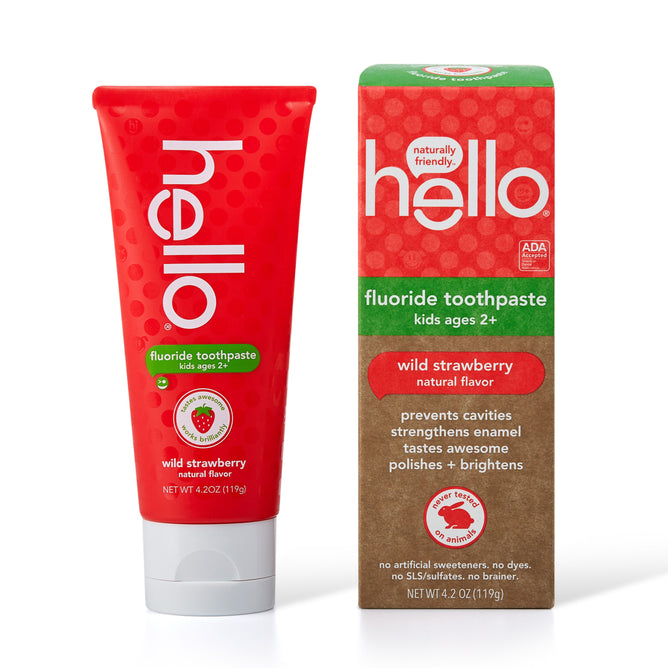 Hello Kids Wild Strawberry Fluoride Toothpaste for ages 2+ comes in a red tube and box. It prevents cavities, strengthens enamel, and polishes teeth with no artificial sweeteners. ADA accepted, flavored naturally with wild strawberry. Net weight: 4.2 oz.