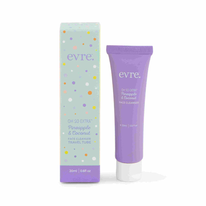 A purple tube of evre. Oh So Extra Pineapple & Coconut Face Cleanser - Sample sits beside its light green box with colorful dots. Both display the product name and size (20ml | 0.67 fl oz).