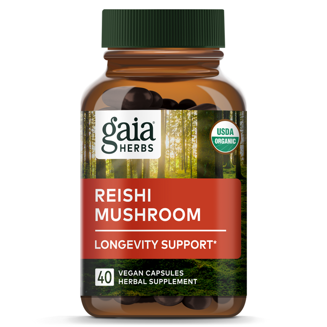 A bottle of Gaia Herbs Reishi Mushroom capsules, labeled for immune and heart support, contains 40 USDA organic-certified vegan capsules. The amber bottle with a green cap and forest background highlights its adaptogen properties.