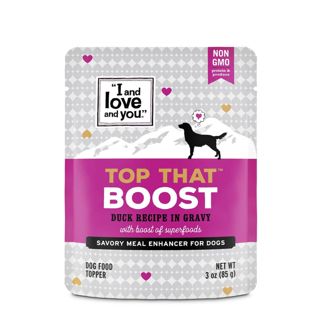 The Top That Boost Duck Recipe in Gravy by I and Love and You is a 3 oz wet dog food enhancer. Its gray packaging with diamond patterns displays a black dog silhouette and purple, gold, and pink heart accents, making it an ideal nutritious topper for your furry friend.