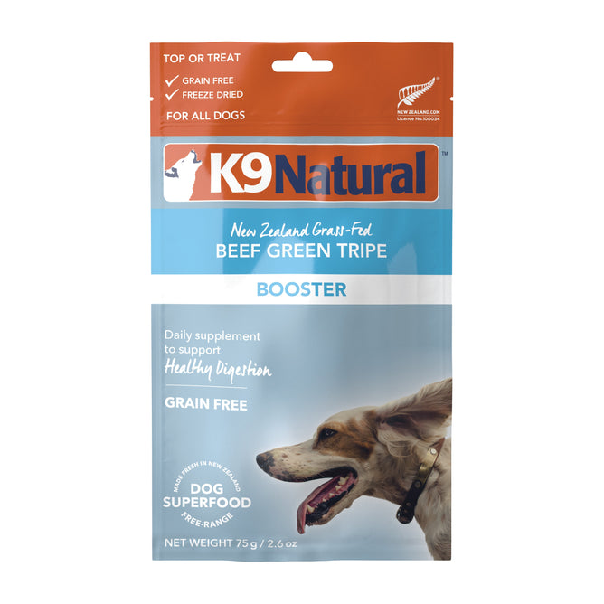 A 75g package of K9 Naturals Grain-Free Freeze-Dried Dog Food Supplement Booster features a dogs profile on a blue and orange bag, highlighting its benefits for healthy canine digestion.