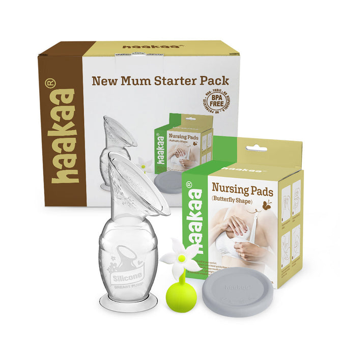 The Haakaa New Mom Starter Pack is ideal for breastfeeding mothers and features a silicone breast pump, flower stopper, lid, and butterfly-shaped nursing pads. These products stand out beautifully against a plain white background with clear branding.