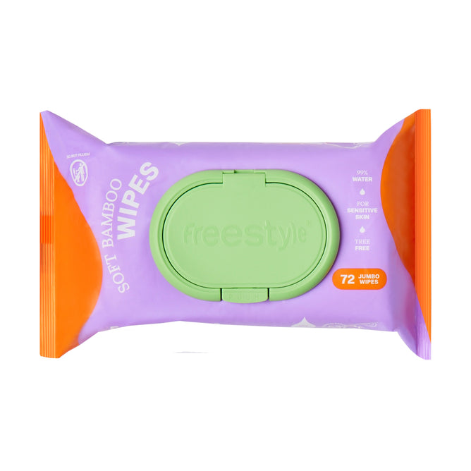 A Grove Collaborative packet of soft-clean-jumbo-wipes features a purple and orange design, highlighting 99% water and for sensitive skin. It contains 72 jumbo wipes and has a green pop-up lid.