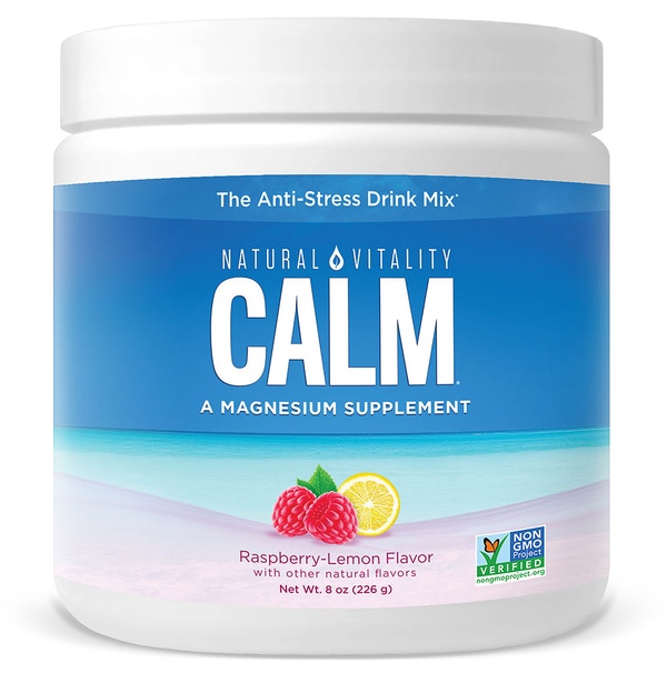 A white container of Natural Vitality Calm Magnesium Powder for muscle relaxation features a The Anti-Stress Drink Mix label, with a Raspberry-Lemon flavor and images of raspberries and lemon slice. Its non-GMO verified and weighs 8 oz (226 g).