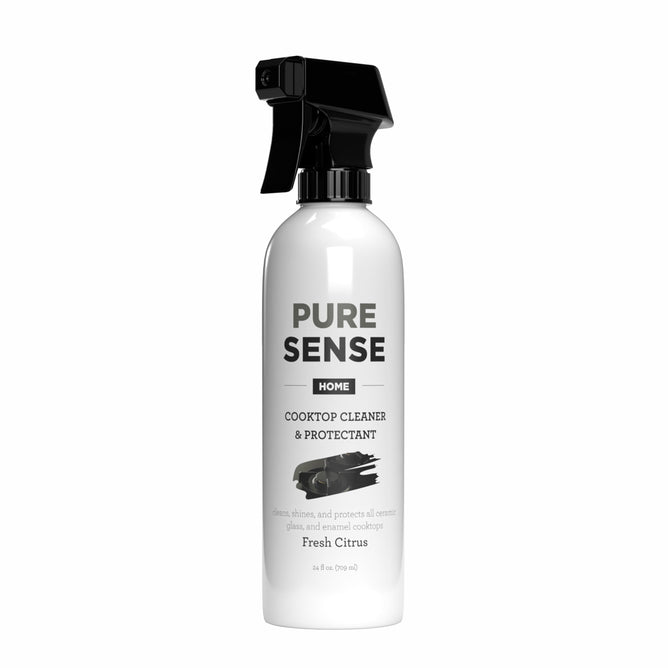 The Pure Sense Ceramic Cooktop Cleaner & Protectant, a white spray bottle with a black nozzle, offers a plant-conscious formula with Fresh Citrus scent, expertly designed to clean, shine, and protect ceramic cooktops for lasting brilliance.