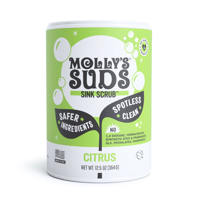 Mollys Suds Sink SCRUB™ in aromatic Citrus scent comes in a green and white 12.5 oz (354g) container. The label emphasizes Safer Ingredients, Spotless Clean, and absence of 1,4 Dioxane, Formaldehyde, Synthetic Dyes & Fragrances, SLS, Phthalates, and Phosphates.