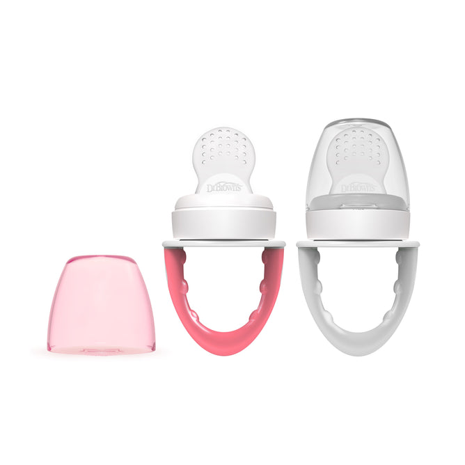 Dr. Browns Fresh Firsts Silicone Feeder includes two BPA-free silicone teethers with handles (one pink, one white) and a pink cap. These circular-topped teethers are designed to soothe gums and are ideal for introducing solid food feeding to infants.