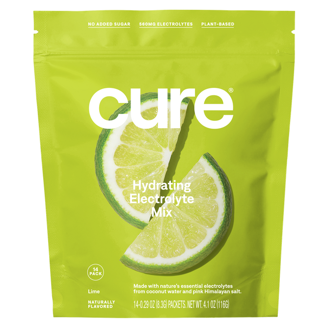 A vibrant green package of Cure Hydrations Hydrating Electrolyte Drink Mix features lime slice imagery, highlighting No Added Sugar, 850mg Electrolytes, and Plant-Based. With Coconut Water for a natural taste, each bag contains 14 packets.