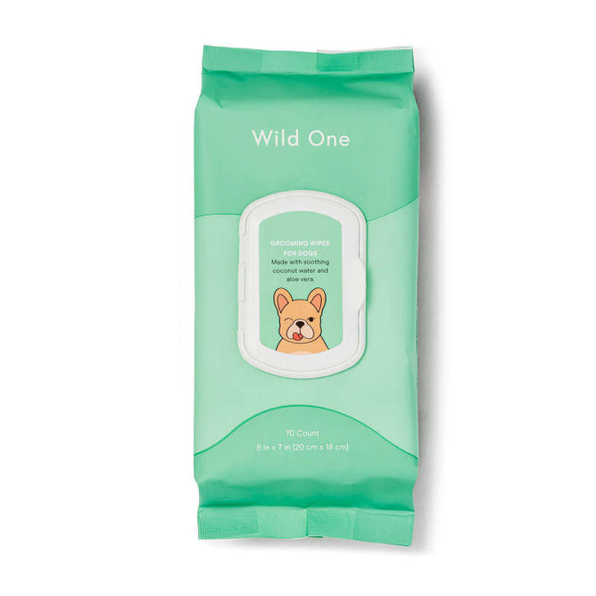 The green Wild One Dog Grooming Wipes package, showing a cartoon dog, promises hypoallergenic care with coconut water and aloe vera. Each pack contains 70 wipes, each measuring 8 x 7 inches (20 cm x 18 cm), perfect for gentle pet care.