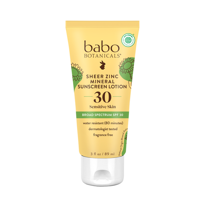 A tube of Babo Botanicals Clear Zinc Sunscreen Lotion offers SPF 30 protection for sensitive skin. Its water-resistant for 80 minutes, dermatologist-tested, fragrance-free, and has a green seal on the top right corner. Contains 3 fl oz (89 ml).