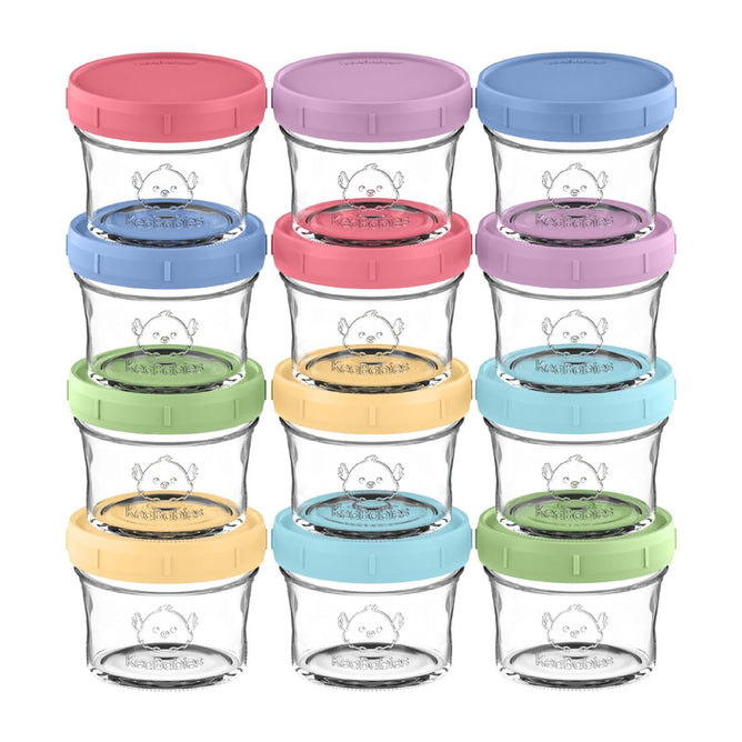 Twelve KeaBabies Glass Baby Food & Snack Storage Containers are in three columns and four rows. Each sustainable, empty jar features a colorful lid—pink, purple, red, blue, green, or yellow—with a cute cartoon face, perfect for homemade baby food storage.