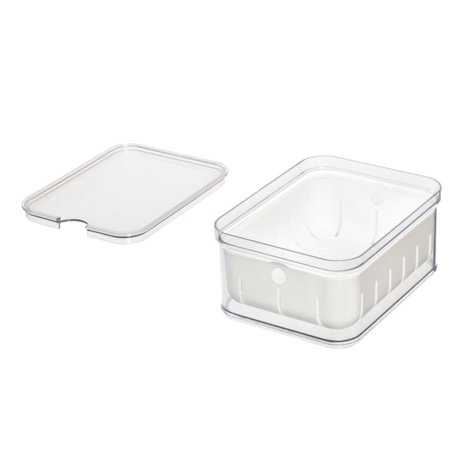 A clear, rectangular iDesign Berry Basket Bin made with recycled plastic and its matching lid sit on a white background. The open container reveals an empty, transparent interior with a slotted-bottom design for optimal freshness.